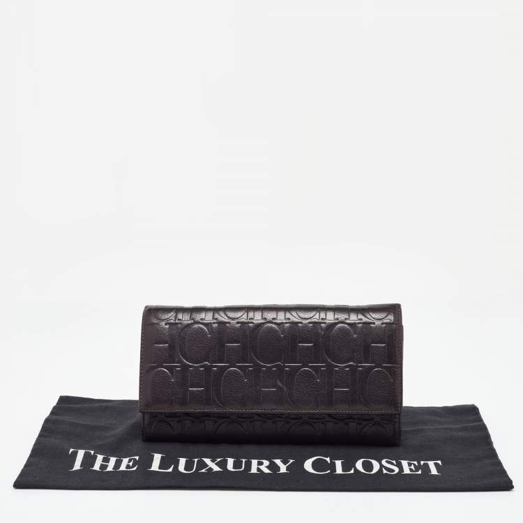 Pre Owned CH Carolina Herrera Brown Monogram Embossed Leather Trifold Clutch