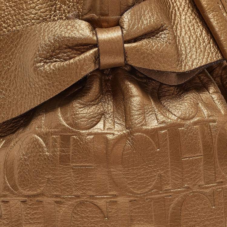 Pre Owned CH Carolina Herrera Gold Monogram Embossed Leather Bow Bucket Bag
