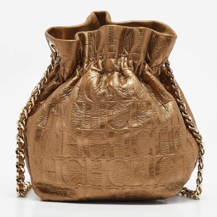 Pre Owned CH Carolina Herrera Gold Monogram Embossed Leather Bow Bucket Bag