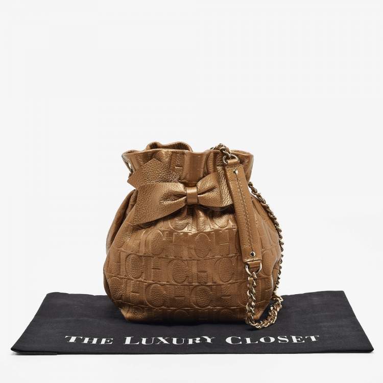 Pre Owned CH Carolina Herrera Gold Monogram Embossed Leather Bow Bucket Bag