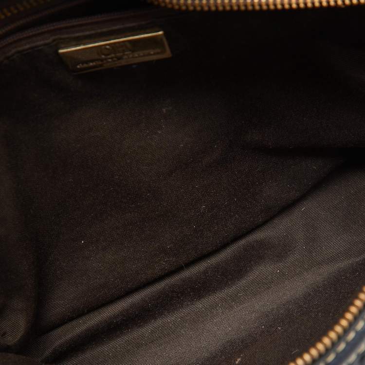 Pre Owned CH Carolina Herrera Navy Blue Monogram Embossed Leather Flap Top Handle Bag
