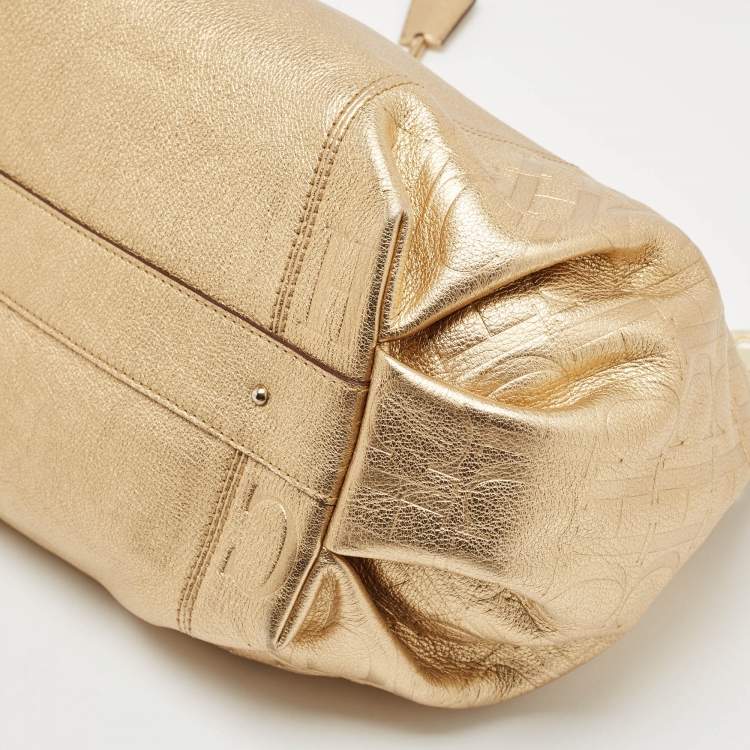 Pre Owned CH Carolina Herrera Gold Monogram Embossed Leather Dahlia Hobo