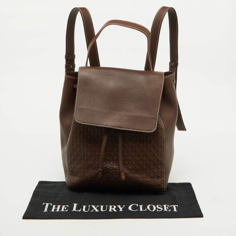 Pre Owned CH Carolina Herrera Brown Monogram Embossed Leather Flap Backpack