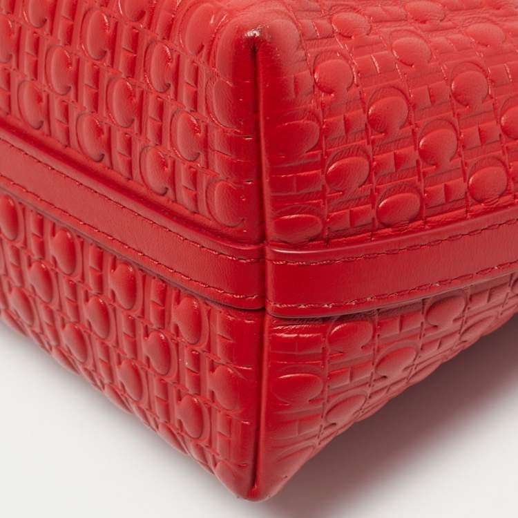 Pre Owned CH Carolina Herrera Red Monogram Embossed Leather Pochette Bag