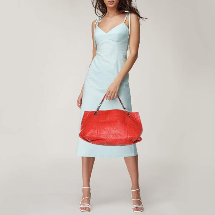 Pre Owned CH Carolina Herrera Red Monogram Embossed Leather Chain Handle Tote