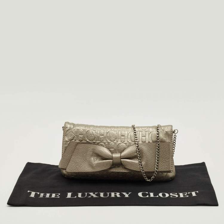 Pre Owned CH Caroline Herrera Metallic Grey Monogram Embossed Leather Bow Chain Clutch