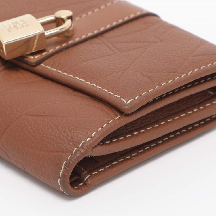 Pre Owned CH Carolina Herrera Brown Monogram Leather Matryoshka Lock Compact Wallet