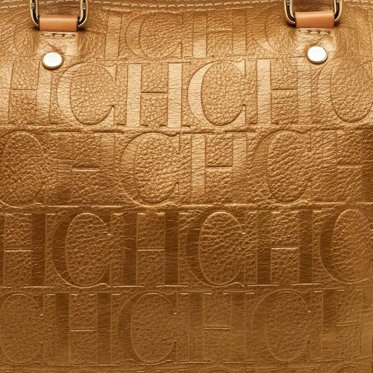 Pre Owned حقيبة بوسطن سي أتس كارولينا هيريرا أندي كبيرة جلد بنقشة مونوجرامي ذهبي معدني