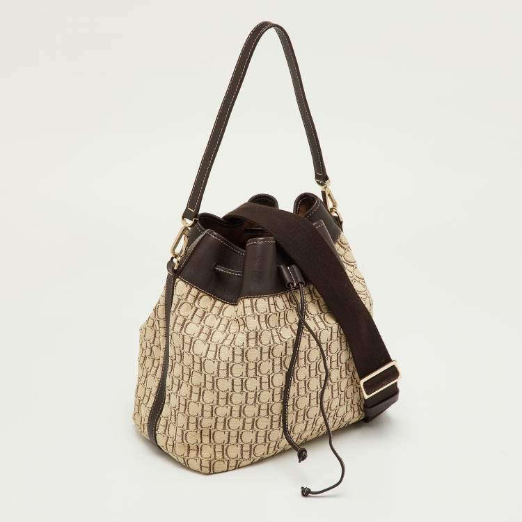 Pre Owned CH Carolina Herrera Brown/Beige Monogram Canvas and Leather Drawstring Bucket Bag
