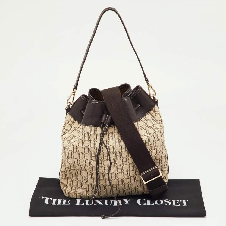 Pre Owned CH Carolina Herrera Brown/Beige Monogram Canvas and Leather Drawstring Bucket Bag
