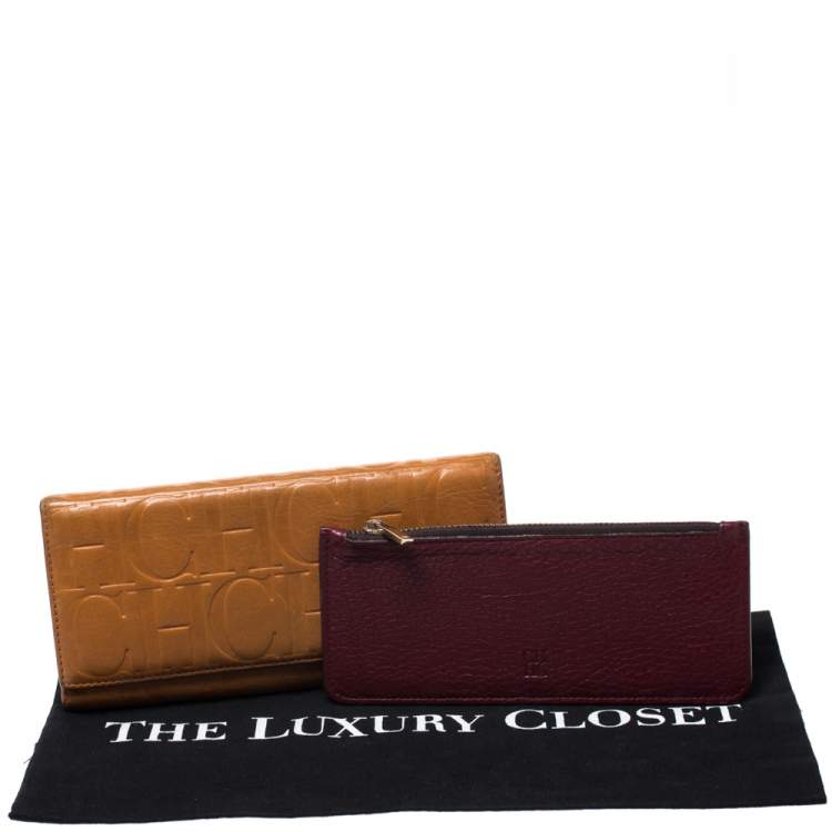 Pre Owned CH Carolina Herrera Mustard Monogram Embossed Leather Trifold Continental Wallet