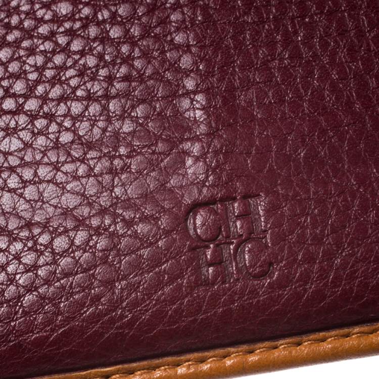 Pre Owned CH Carolina Herrera Mustard Monogram Embossed Leather Trifold Continental Wallet
