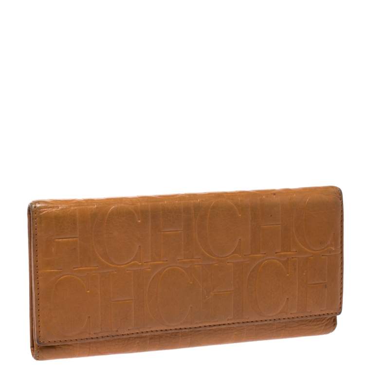 Pre Owned CH Carolina Herrera Mustard Monogram Embossed Leather Trifold Continental Wallet