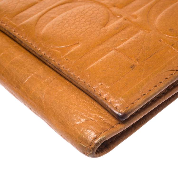 Pre Owned CH Carolina Herrera Mustard Monogram Embossed Leather Trifold Continental Wallet