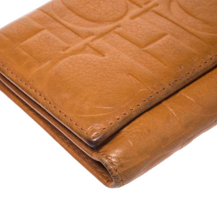 Pre Owned CH Carolina Herrera Mustard Monogram Embossed Leather Trifold Continental Wallet