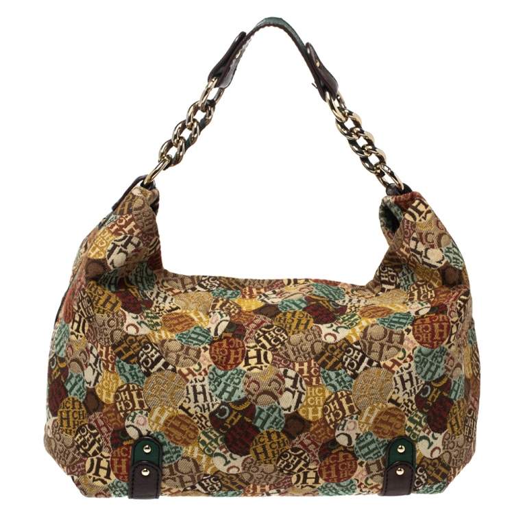 Pre Owned Carolina Herrera Multicolor Signature Print Fabric and Leather Hobo