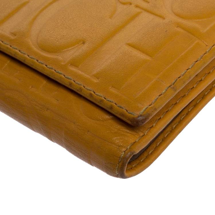Pre Owned Carolina Herrera Yellow Monogram Leather Continental Wallet