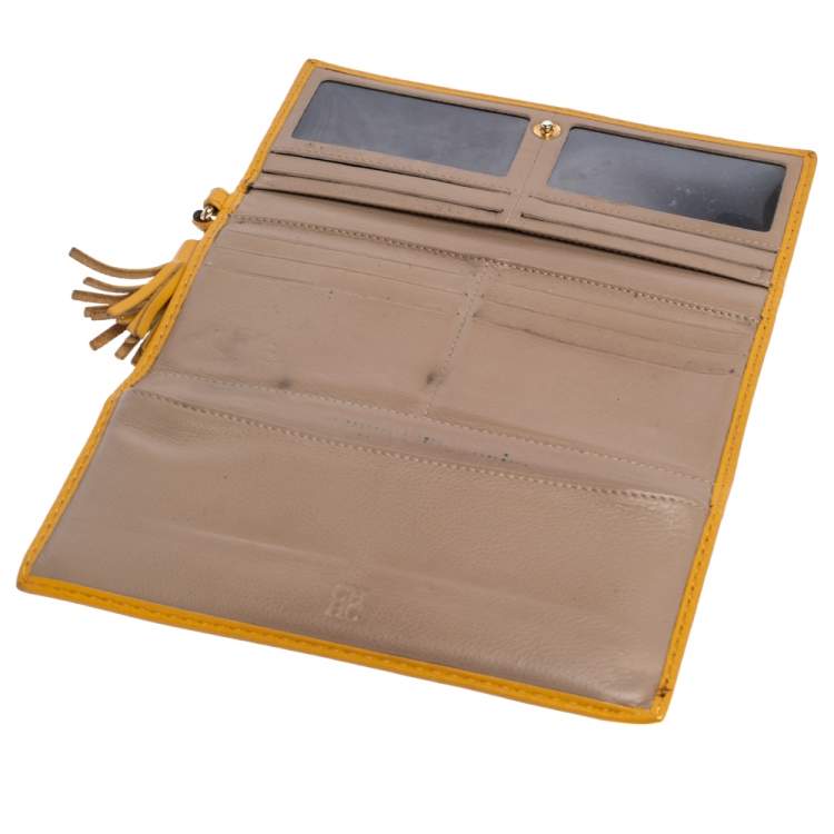 Pre Owned Carolina Herrera Yellow Monogram Leather Continental Wallet