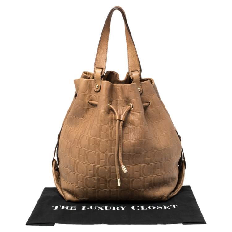 Pre Owned CH Carolina Herrera Brown Monogram Leather Drawstring Hobo