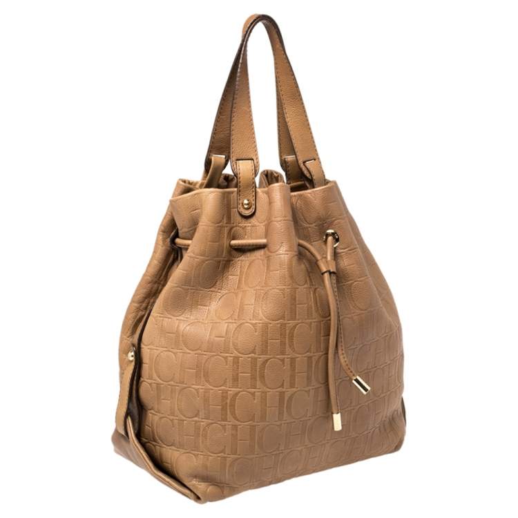 Pre Owned CH Carolina Herrera Brown Monogram Leather Drawstring Hobo