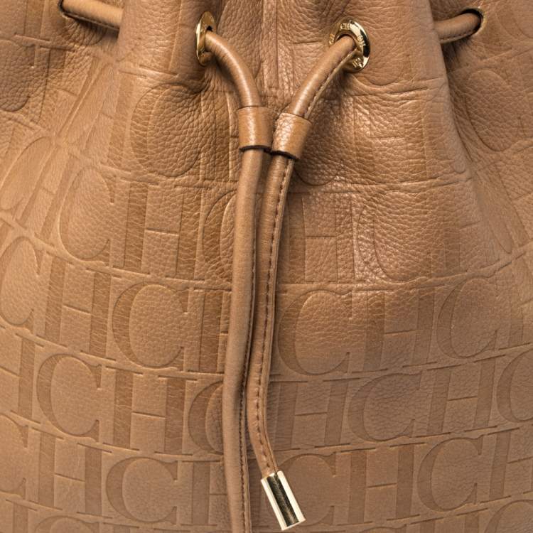 Pre Owned CH Carolina Herrera Brown Monogram Leather Drawstring Hobo