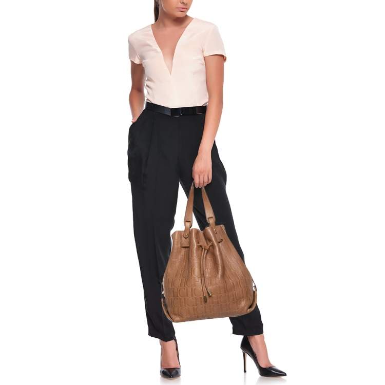 Pre Owned CH Carolina Herrera Brown Monogram Leather Drawstring Hobo