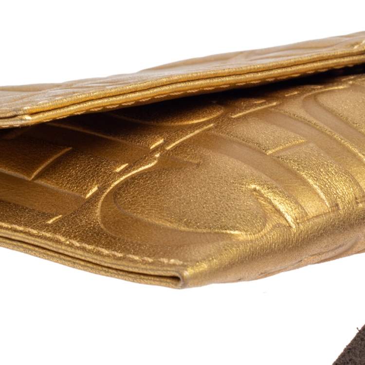 Pre Owned Carolina Herrera Metallic Gold Monogram Leather Tassel Clutch