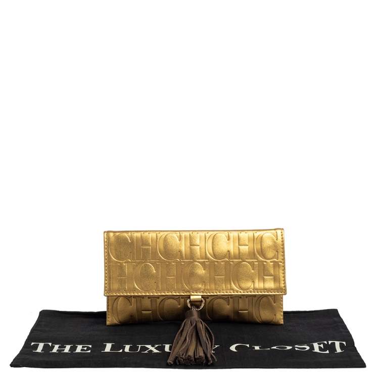 Pre Owned Carolina Herrera Metallic Gold Monogram Leather Tassel Clutch