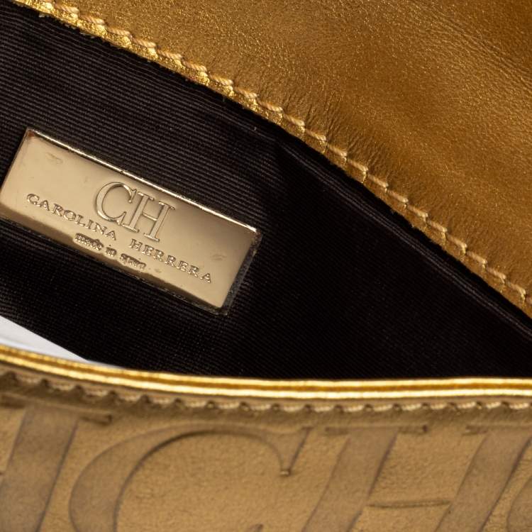 Pre Owned Carolina Herrera Metallic Gold Monogram Leather Tassel Clutch