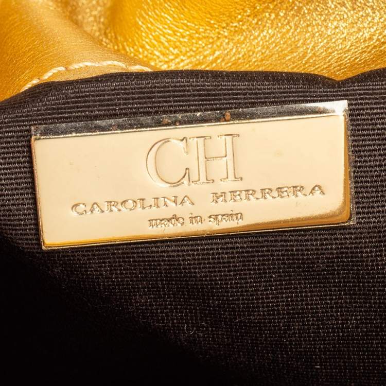 Pre Owned Carolina Herrera Gold Monogram Leather Tassel Clutch