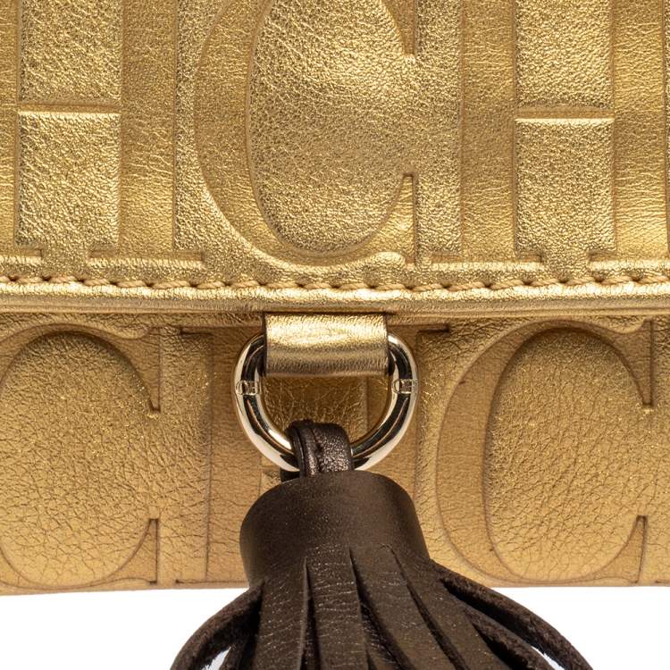 Pre Owned Carolina Herrera Gold Monogram Leather Tassel Clutch