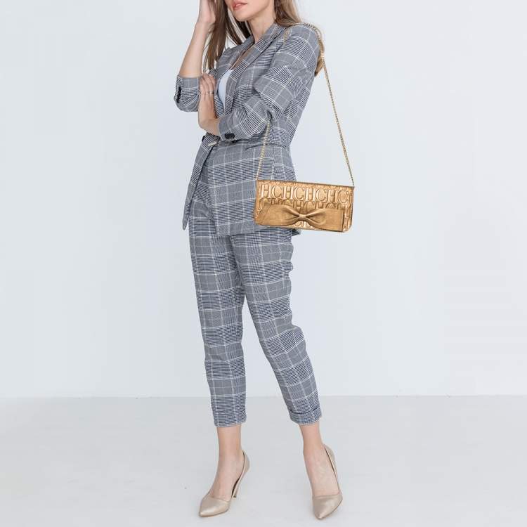 Pre Owned Carolina Herrera Gold Monogram Embossed Leather Bow Chain Clutch 