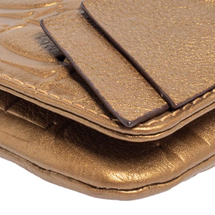Pre Owned Carolina Herrera Gold Monogram Embossed Leather Bow Chain Clutch 