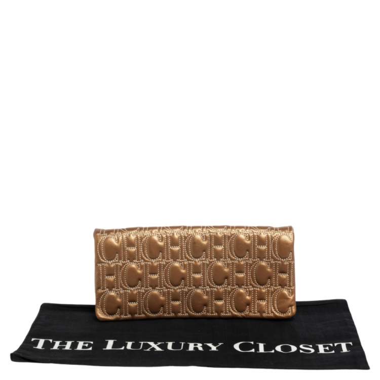 Pre Owned CH Carolina Herrera Gold Monogram Leather Clutch