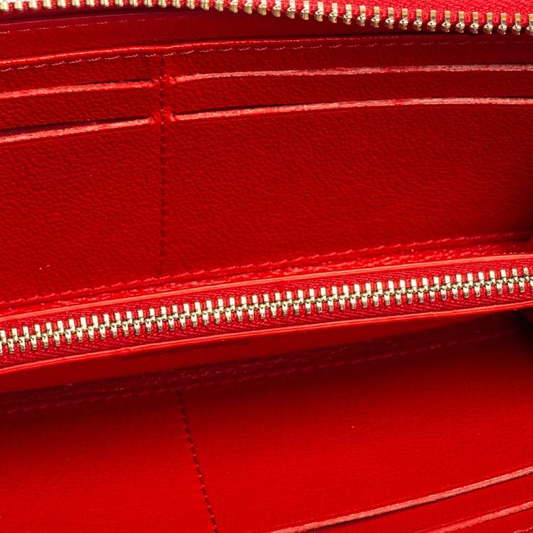 Pre Owned CH Carolina Herrera Monogram Embossed Leather Zip Around Wallet