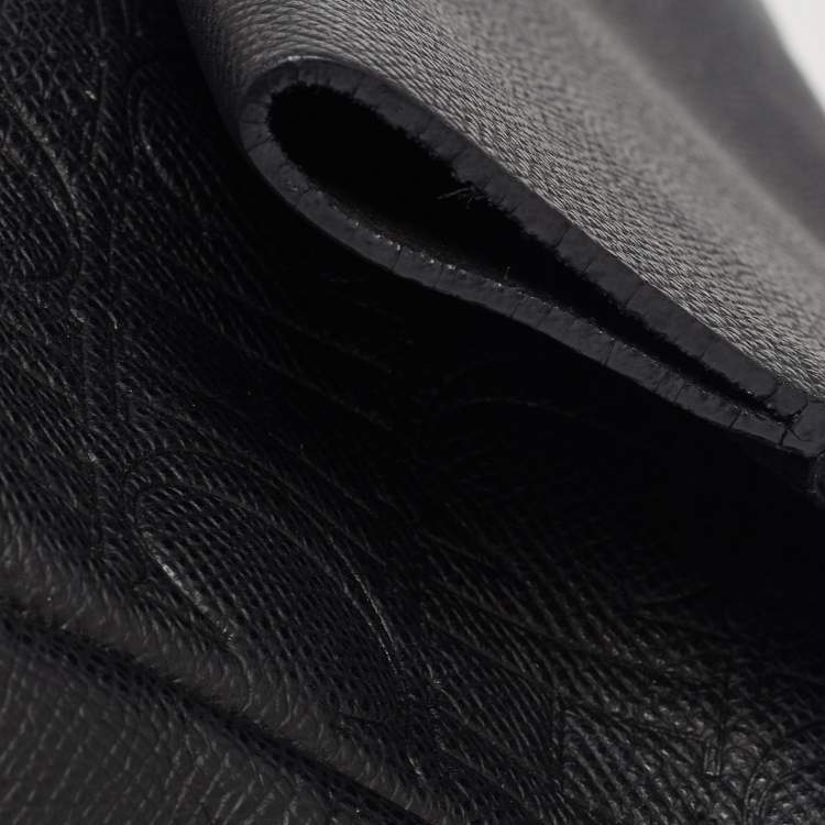 Pre Owned CH Carolina Herrera Black Monogram Embossed Leather Minuetto Top Handle Bag