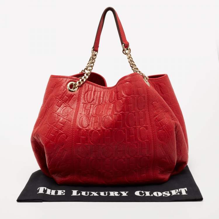 Pre Owned CH Carolina Herrera Red Monogram Embossed Leather Chain Hobo