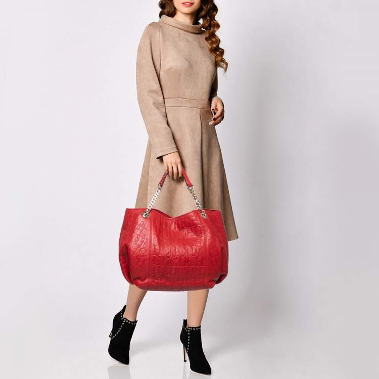 Pre Owned CH Carolina Herrera Red Monogram Embossed Leather Chain Hobo