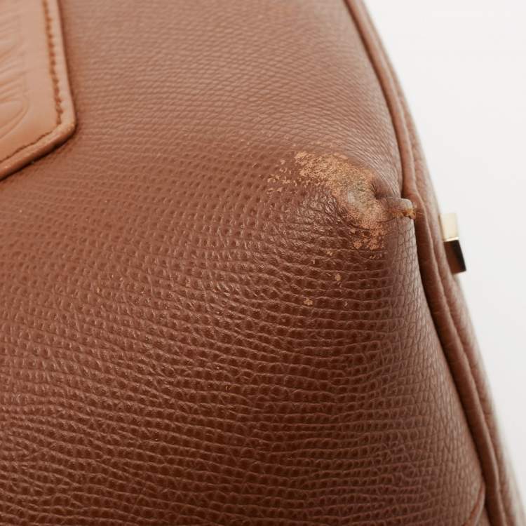 Pre Owned CH Carolina Herrera Brown Monogram Embossed Leather Push Lock Flap Top Handle Bag