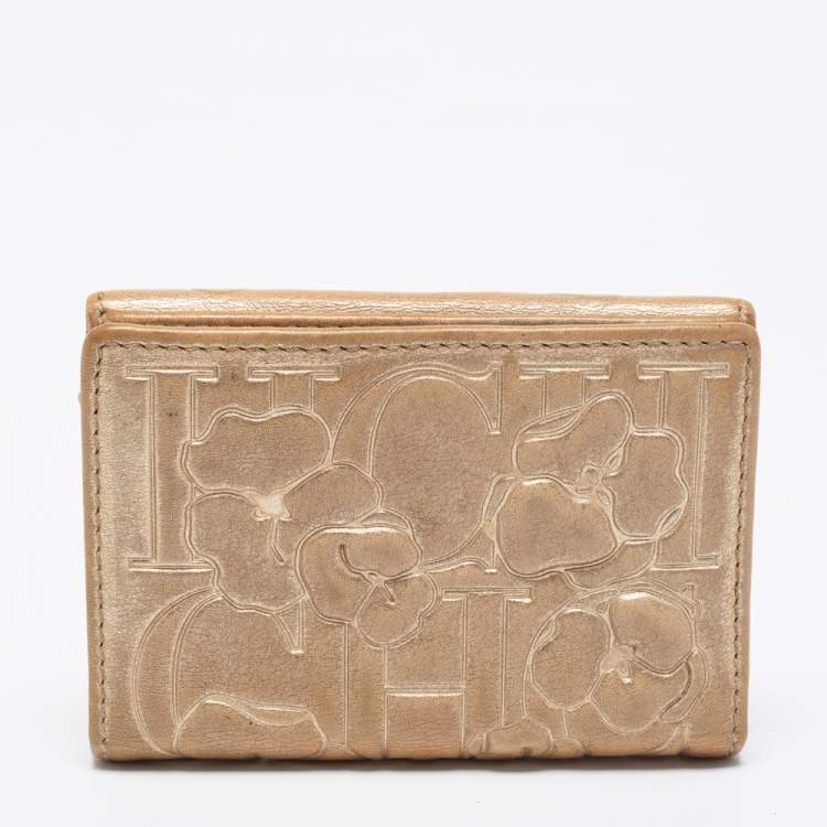 Pre Owned CH Carolina Herrera Gold Floral Embossed Leather Flap Compact Wallet