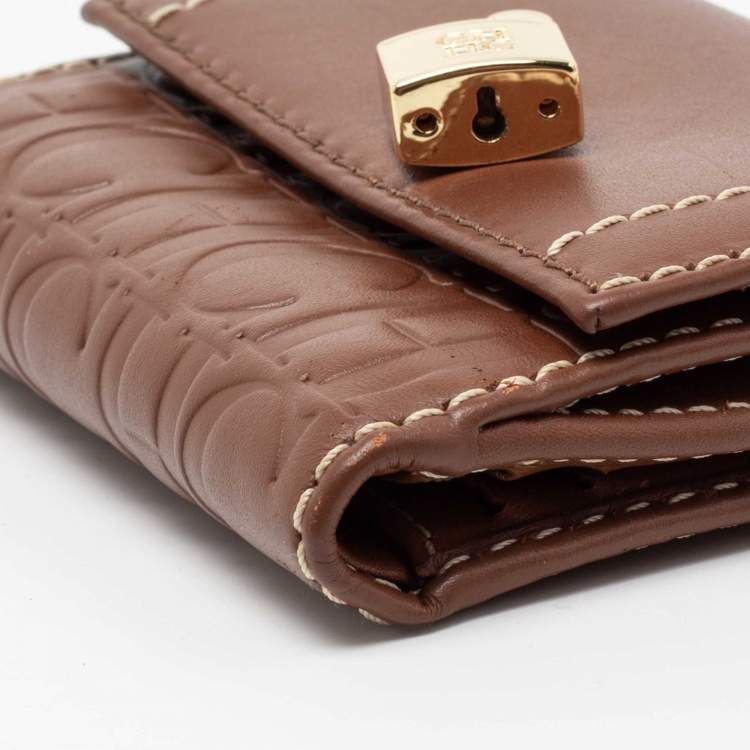 Pre Owned CH Carolina Herrera Tan Monogram Leather Matryoshka Lock Compact Wallet