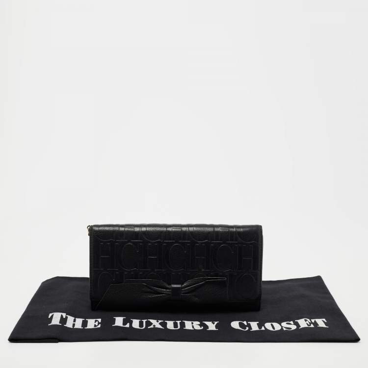 Pre Owned CH Carolina Herrera Black Monogram Embossed Leather Bow Flap Clutch