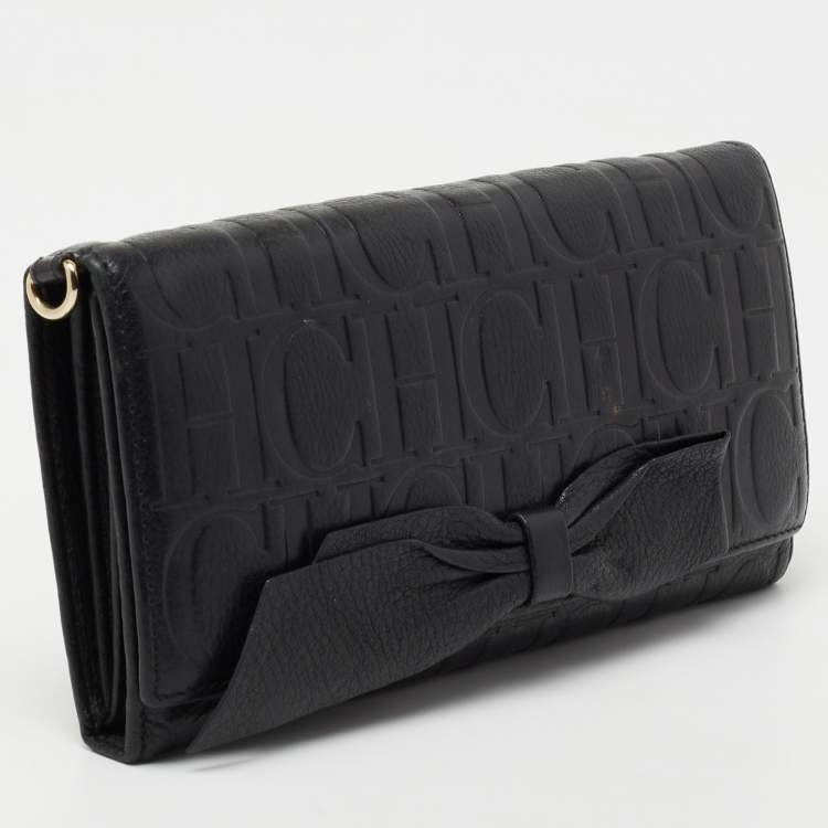 Pre Owned CH Carolina Herrera Black Monogram Embossed Leather Bow Flap Clutch