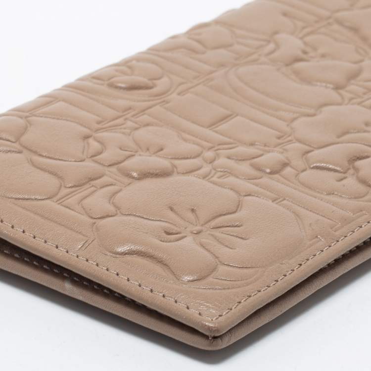 Pre Owned CH Carolina Herrera Beige Floral Embossed Leather Bifold Continental Wallet