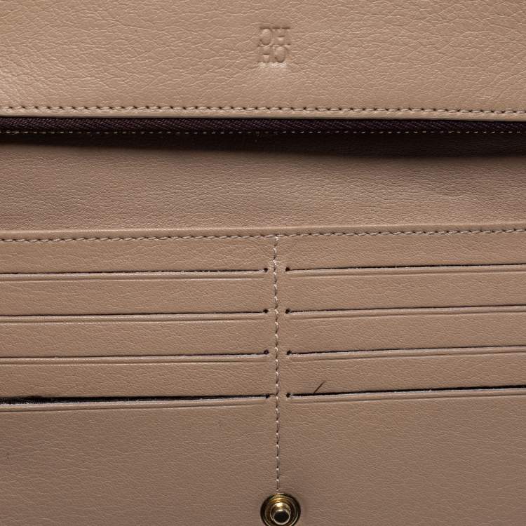 Pre Owned CH Carolina Herrera Beige Floral Embossed Leather Bifold Continental Wallet