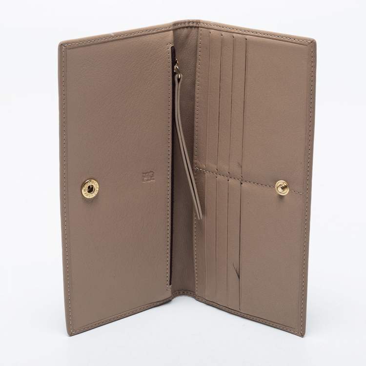 Pre Owned CH Carolina Herrera Beige Floral Embossed Leather Bifold Continental Wallet