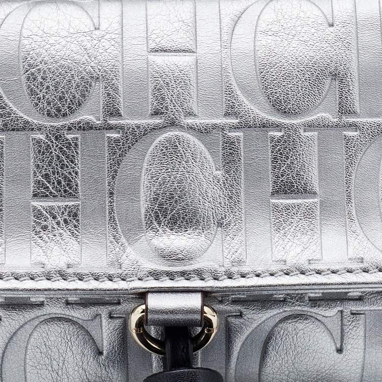 Pre Owned CH Carolina Herrera Metallic Silver Monogram Leather Tassel Clutch