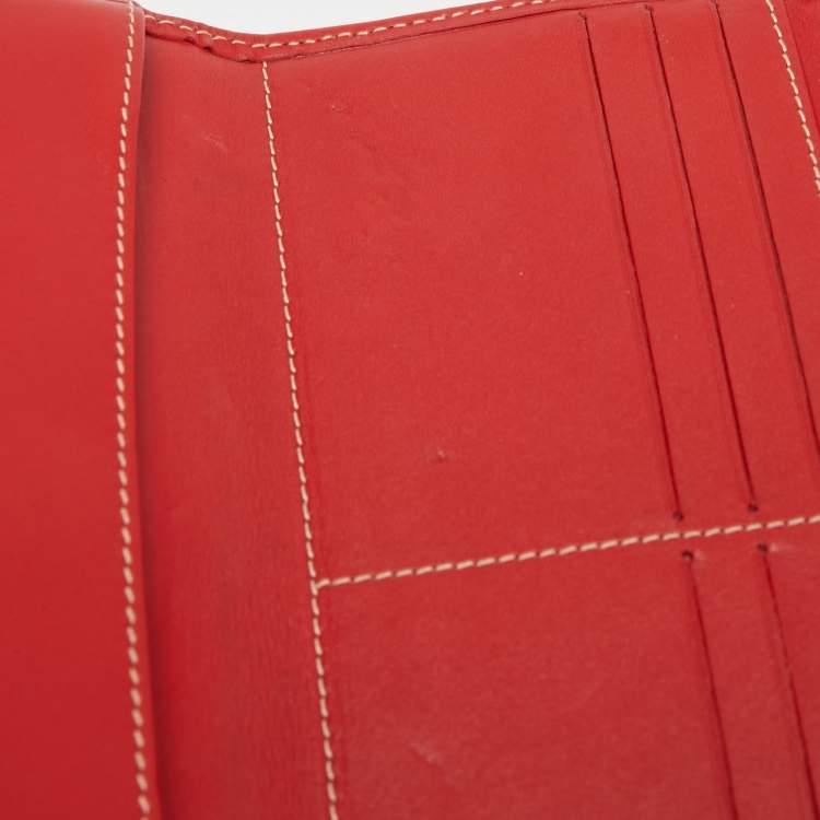 Pre Owned Carolina Herrera Red Monogram Embossed Leather Flap Continental Wallet