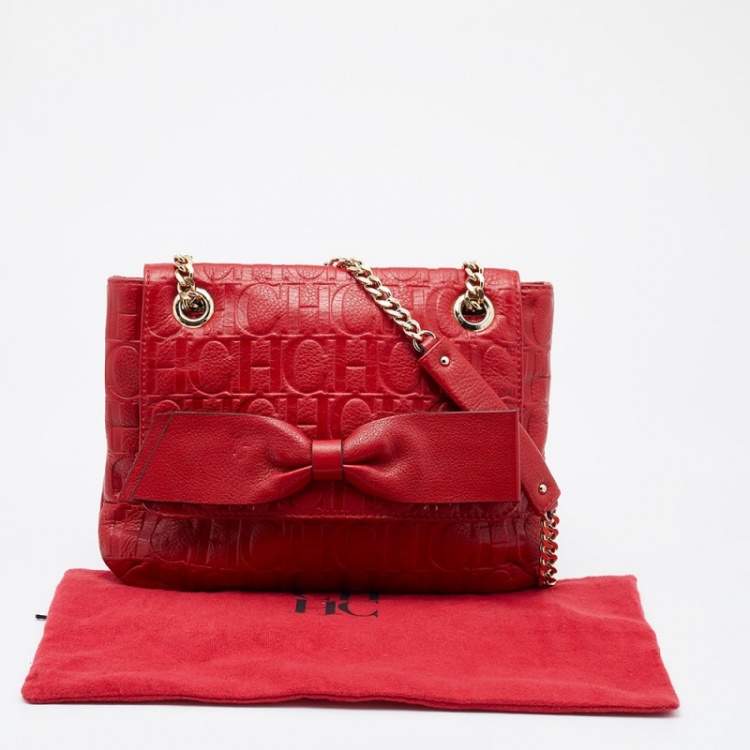 Pre Owned CH Carolina Herrera Red Monogram Embossed Leather Bow Shoulder Bag