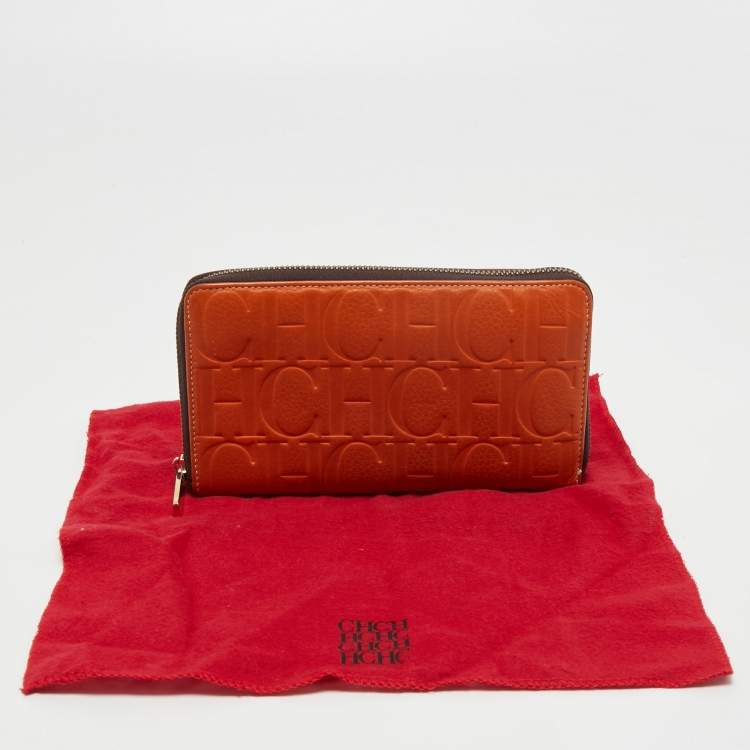 Pre Owned CH Carolina Herrera Orange Monogram Embossed Leather Zip Around Wallet